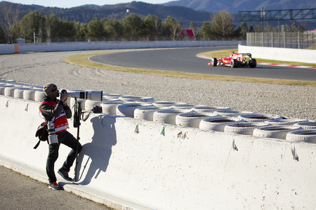 Sebastian Vettel racing with his Ferrari at Formula One Test Days at Catalunya circuit, on February 22, 2015, in Barcelona, Spainのeditorial素材