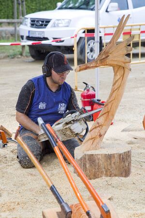 Wood sculpture competition with chainsaw, on July 27, 2019, in Alella, Barcelona, Spain.のeditorial素材