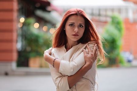 Hot sexy redhair woman in the city. Half naked girl. Fashion art photo.の写真素材