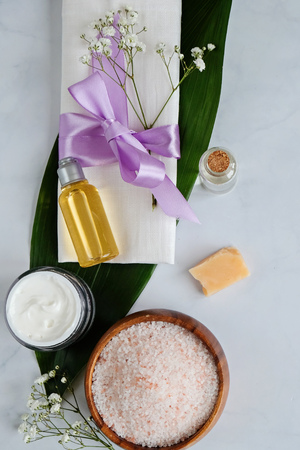 Spa natural skin care products background, cosmetic products creative layout, top view, vertical lat layの写真素材