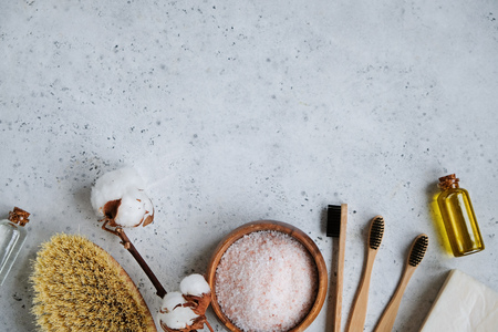 Spa natural skin care products background, cosmetic products and bamboo toothbrush - creative layout on white backgroundの写真素材