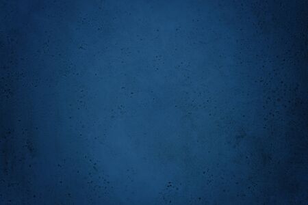 Texture of old dark blue concrete wall for background