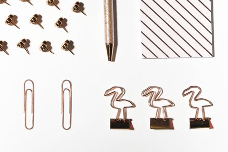 Modern flat lay with office supplies, woman fashion workspace in gold color