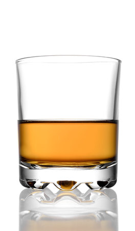 Glass of whiskey on a white backgroundの写真素材