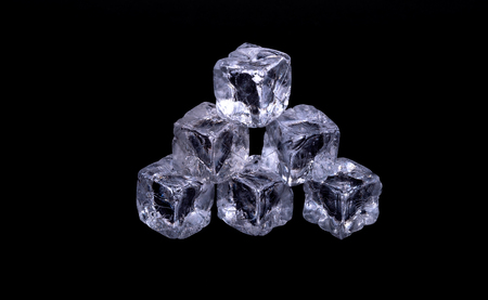 Ice cubes on black backgroundの写真素材