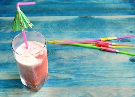 Summer cocktail on blue backgroundの写真素材