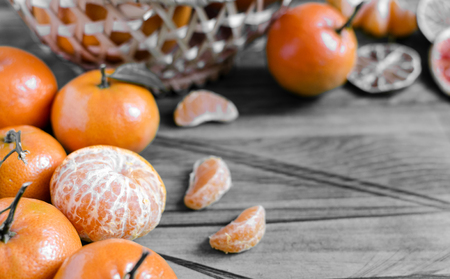 tangerines close-up on black and white backgroundの写真素材