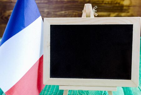 French flags and wooden Board for close-up textの写真素材