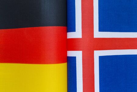 national flags of Germany and Iceland closeup policyの写真素材