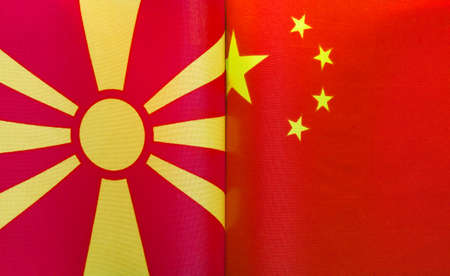 fragments of the national flags of the Republic of North Macedonia and China in close-upの写真素材