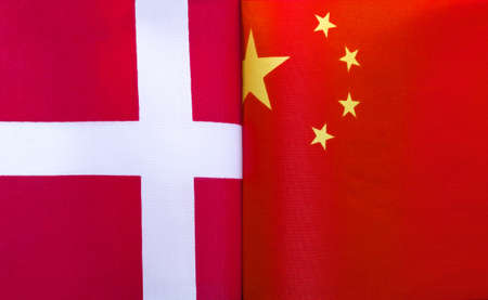 fragments of national flags of Denmark and China close-upの写真素材