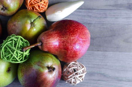 juicy pears on a wooden background top view of Kopi space