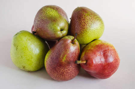 large juicy pears on a light background close up