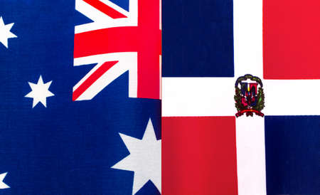 fragments of the national flags of Australia and the Dominican Republic close upの写真素材