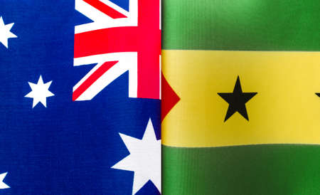 fragments of the national flags of Australia and Sao Tome and Principe close-upの写真素材