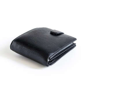 wallet made of black PU leather with a clasp on a white background close-upの写真素材