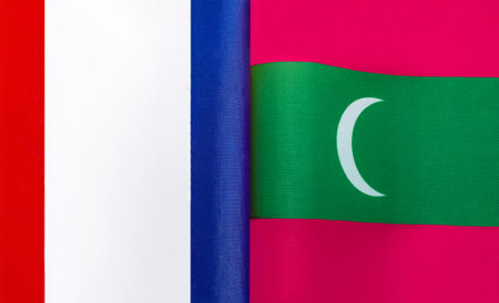fragments of the national flags of France and the Maldives close-upの写真素材