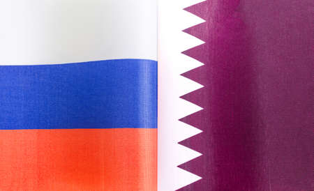 fragments of the national flags of Russia and Qatar close-upの写真素材