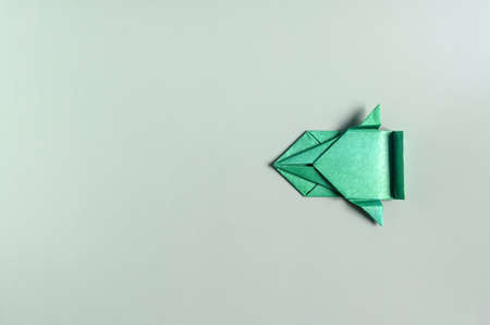 Concept paper car of green color on a green background of kopi space. Origami bright green paper carの写真素材