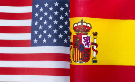 fragments of the national flags of the United States and Spain in close-upの写真素材