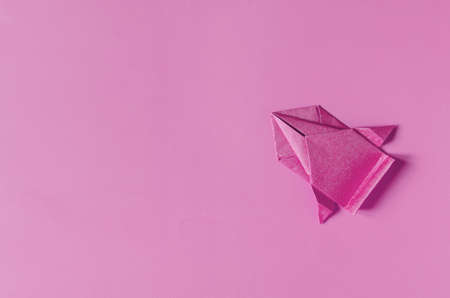 A lilac-colored paper car on a lilac background of the copy space. Origami bright purple paper carの写真素材