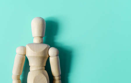 A dark paper ghost in clouds of fog on a dark background is a place for text.の写真素材