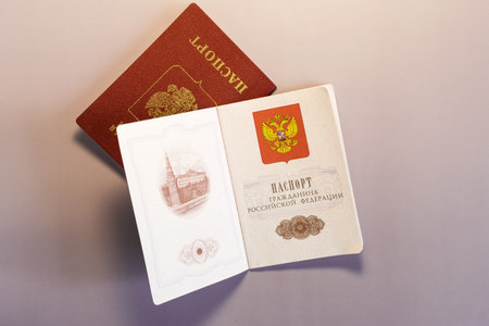 The spread of the first pages of the passport of a citizen of the Russian Federation and the cover of the passport of a citizen of the Russian Federation in close-upのeditorial素材