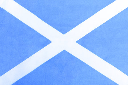 The national flag of Scotland on a dense material close-upの写真素材