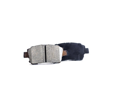Two brake pads for a car in close-up on a light background, isolateの写真素材