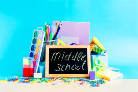 A set of subjects for study and creativity and the description middle school on a dark board