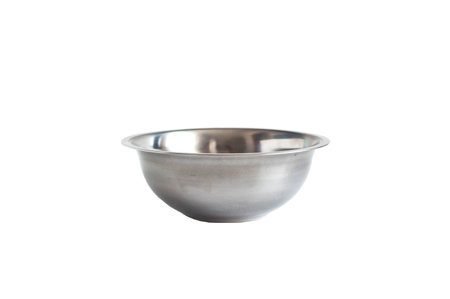 Empty metal bowl on a white background, isolateの写真素材
