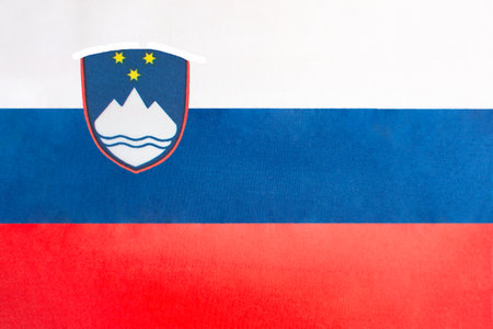 The national flag of Slovenia on a fabric basis in close-upの写真素材