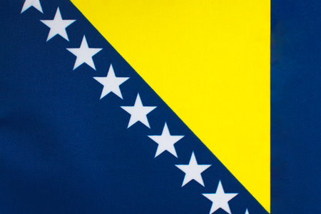 national flag of Bosnia and Herzegovina with fabric texture close-upの写真素材