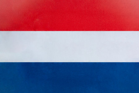 The national flag of the Netherlands on a fabric basis in close-upの写真素材