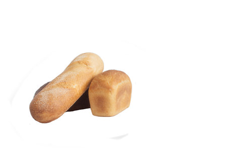 Baguette and bread roll made of wheat and rye flour in close-up on a white background, isolatedの写真素材