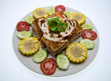 Cordon bleu with vegetables garnishの写真素材