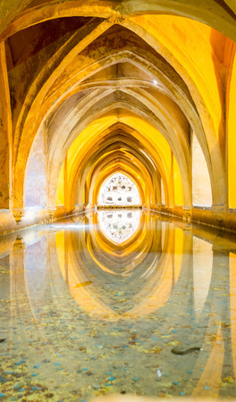 SEVILLE, SPAIN - JUNE 4, 2014 Interior of the Royal Alcazar in Seville, Spain on June 4, 2014. Aljaferia one of the best preserved Moorish palaces in city Saragossaのeditorial素材