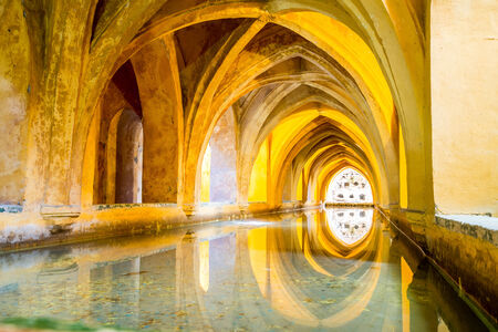 SEVILLE, SPAIN - JUNE 4, 2014 Interior of the Royal Alcazar in Seville, Spain on June 4, 2014. Aljaferia one of the best preserved Moorish palaces in city Saragossaのeditorial素材