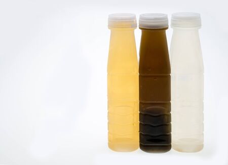 Plastic bottles on white background