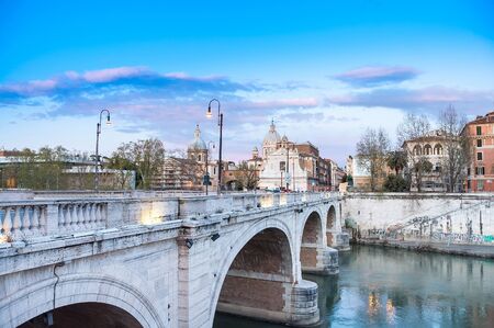 Rome city view with tiber river at duskの写真素材