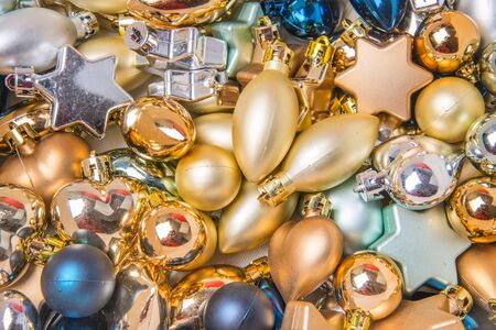 Christmas decorations and gift boxes on wooden board backgroundの写真素材