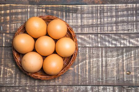 Frsh eggs on wood vintage background