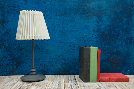 Wooden table with office suppliesの写真素材