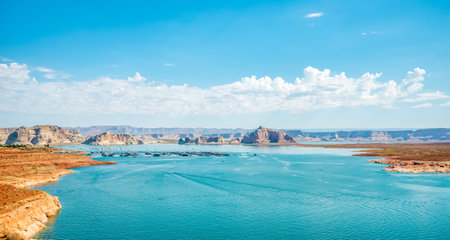 Beautiful orange rock formation at Lake Powell and Glen Canyon Dam in the Glen Canyon National Recreation Area Desert of Arizona and Utah, United Statesの素材 [FY310168763247]