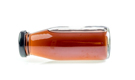Berry mix juice a bottle on a white background.の写真素材