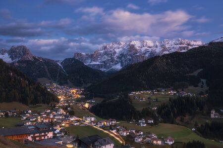 Italy. Dolomites. Autumn evening in the village of Selva di Val Gardena