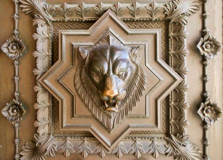 Bronze bas-relief of a lion head from the gate of basilica in Lyon, Franceの写真素材