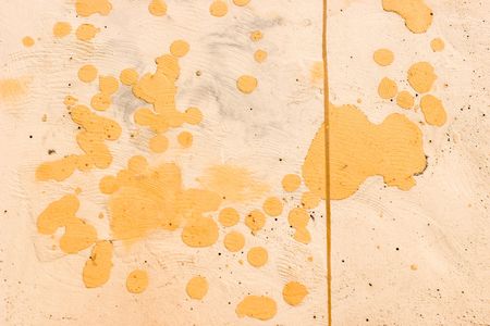 Yellow - orange plastered wall patternの写真素材