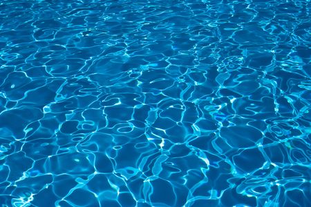 Water ripples at swimming pool background