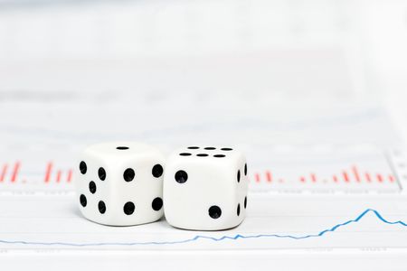 Two cube dice on financial reportの写真素材